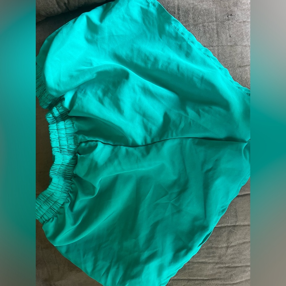 A turquoise pair of shorts from Danskin now an extra small